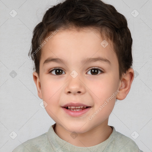 Joyful white child male with short  brown hair and brown eyes