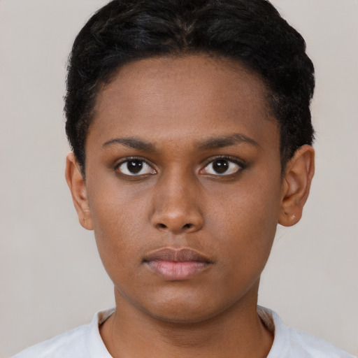 Neutral black young-adult female with short  brown hair and brown eyes