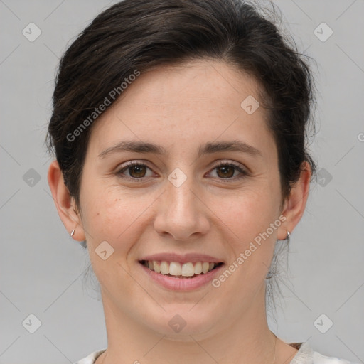 Joyful white young-adult female with medium  brown hair and brown eyes