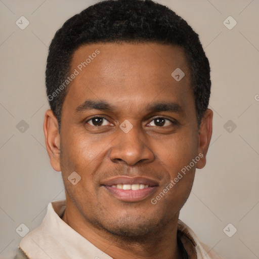 Joyful latino young-adult male with short  brown hair and brown eyes