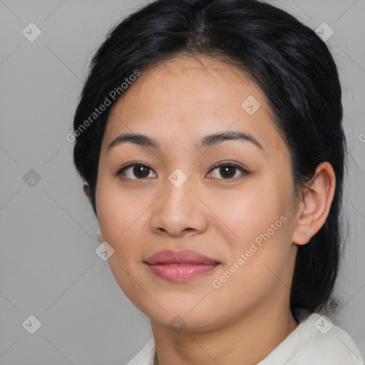 Joyful asian young-adult female with medium  brown hair and brown eyes