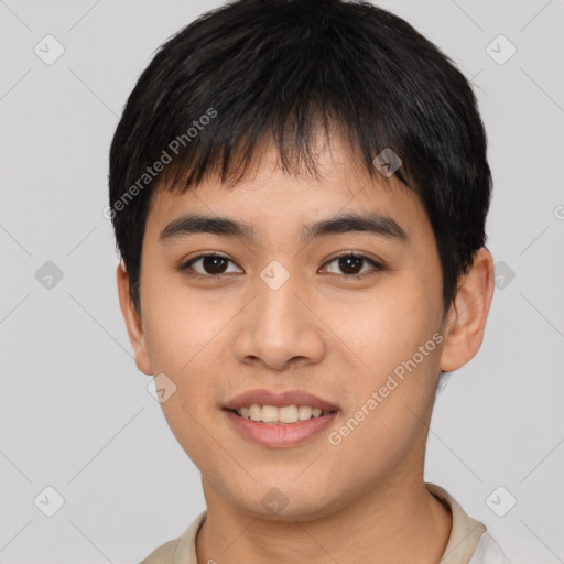 Joyful asian young-adult male with short  black hair and brown eyes