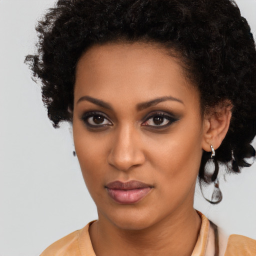 Neutral black young-adult female with short  black hair and brown eyes
