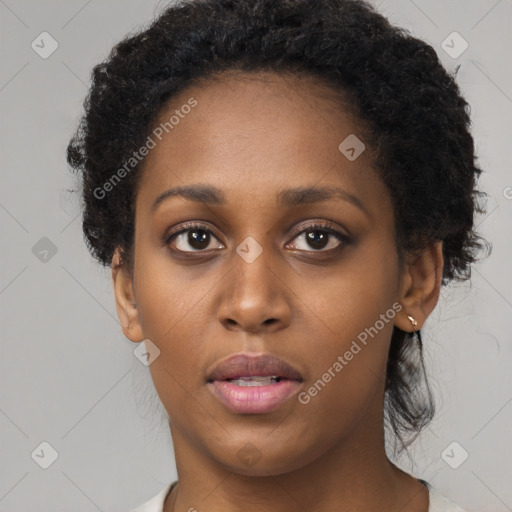 Neutral black young-adult female with short  black hair and brown eyes