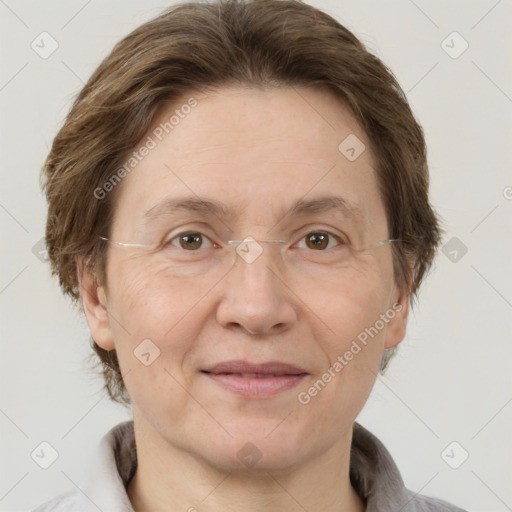 Joyful white adult female with short  brown hair and brown eyes