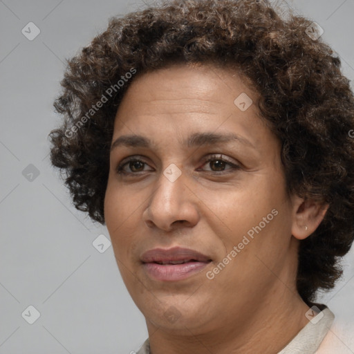 Joyful white adult female with short  brown hair and brown eyes