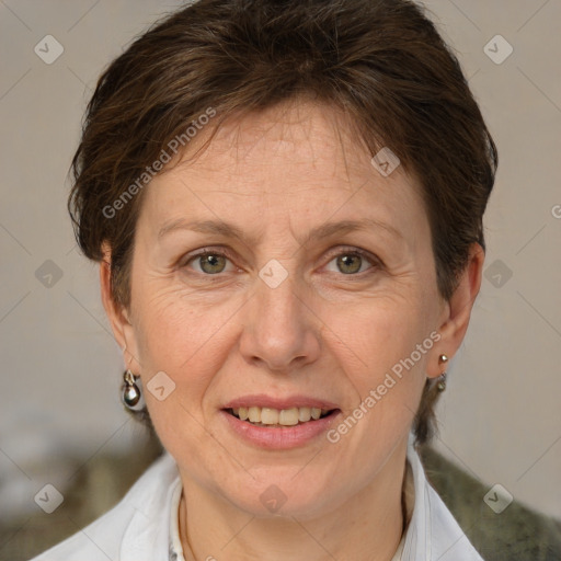 Joyful white adult female with short  brown hair and brown eyes