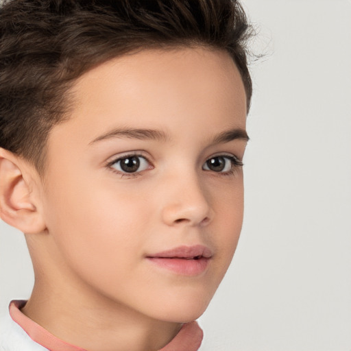 Joyful white child female with short  brown hair and brown eyes