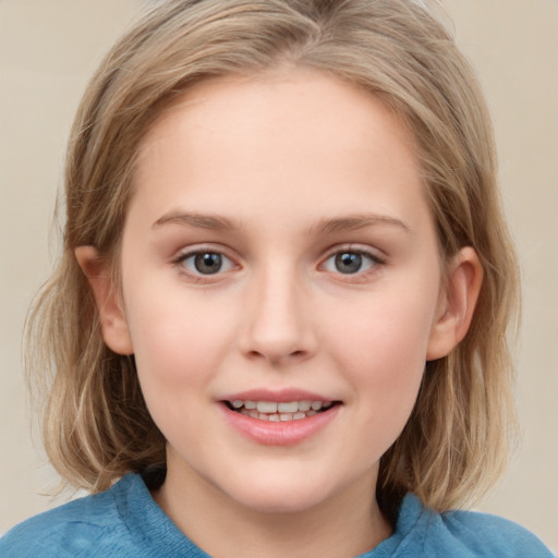 Joyful white child female with medium  brown hair and grey eyes