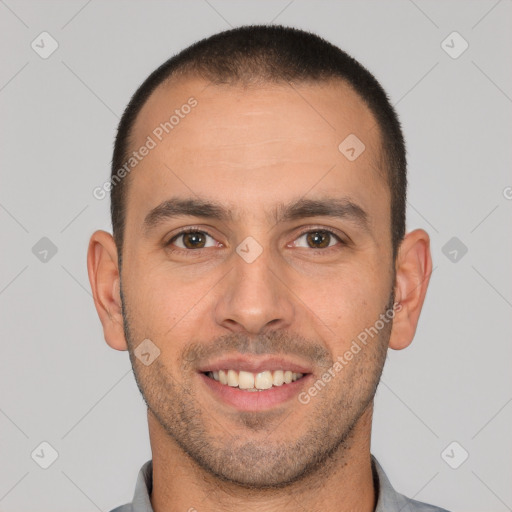 Joyful white young-adult male with short  brown hair and brown eyes