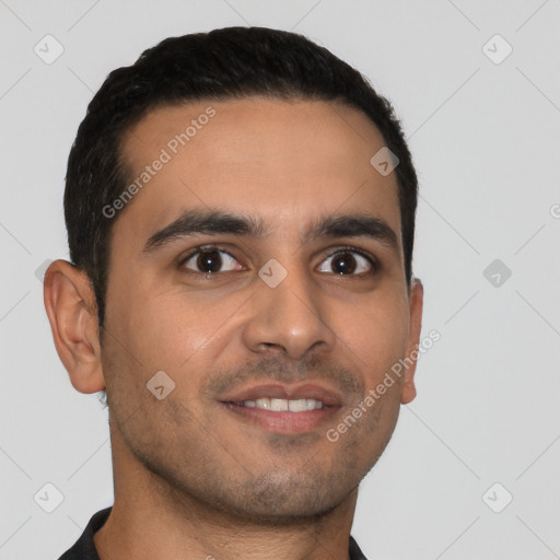 Joyful latino young-adult male with short  brown hair and brown eyes