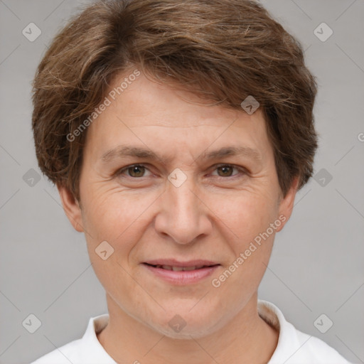 Joyful white adult female with short  brown hair and brown eyes