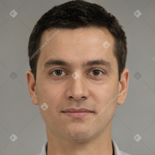 Joyful white young-adult male with short  brown hair and brown eyes