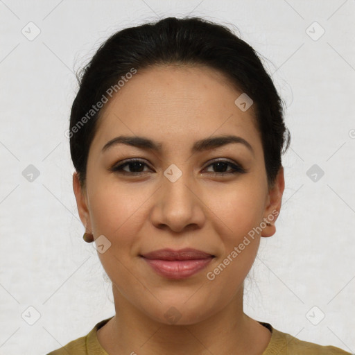 Joyful latino young-adult female with short  brown hair and brown eyes