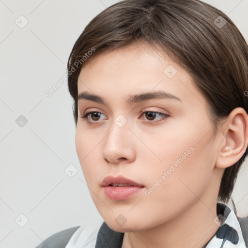 Neutral white young-adult female with medium  brown hair and brown eyes