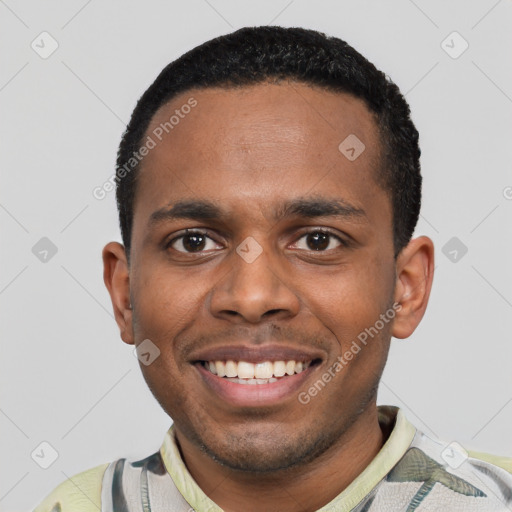 Joyful black young-adult male with short  black hair and brown eyes