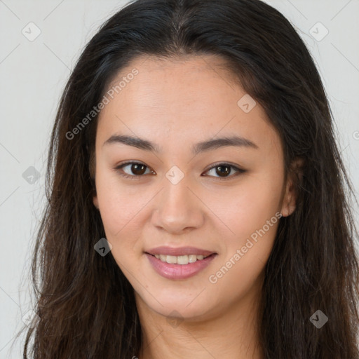 Joyful asian young-adult female with long  brown hair and brown eyes