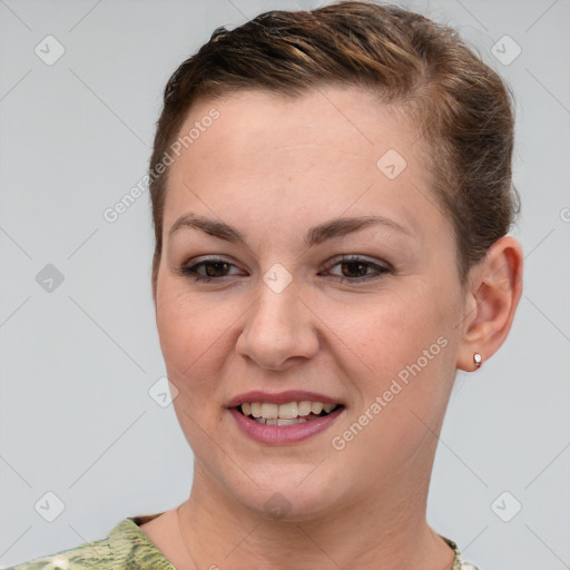 Joyful white young-adult female with short  brown hair and brown eyes