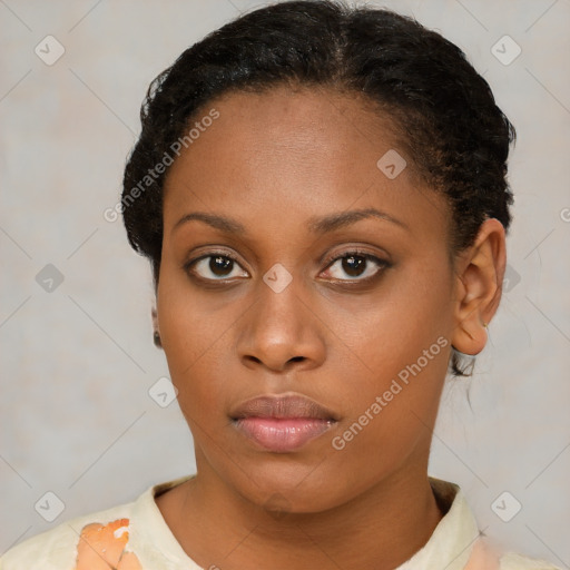 Neutral black young-adult female with short  brown hair and brown eyes