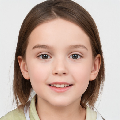 Joyful white child female with medium  brown hair and grey eyes