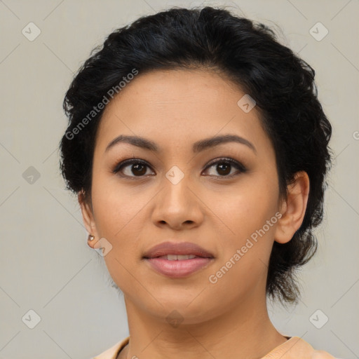 Joyful latino young-adult female with medium  black hair and brown eyes