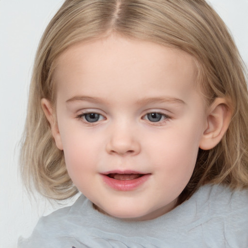 Joyful white child female with medium  brown hair and blue eyes