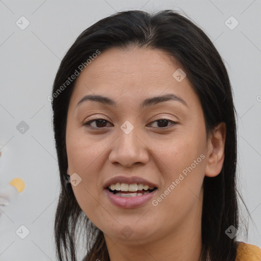 Joyful asian adult female with medium  brown hair and brown eyes