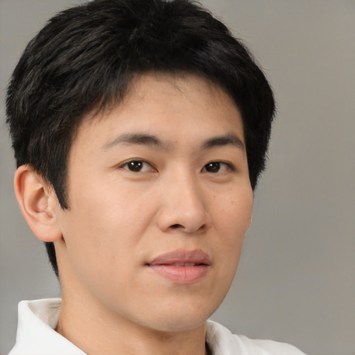 Neutral asian young-adult male with short  brown hair and brown eyes