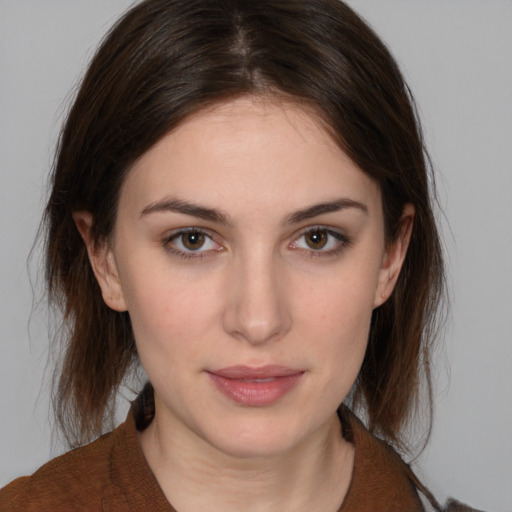 Neutral white young-adult female with medium  brown hair and brown eyes