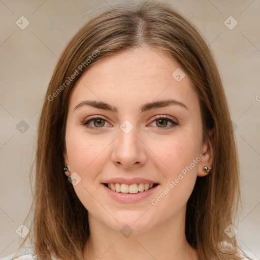 Joyful white young-adult female with medium  brown hair and green eyes