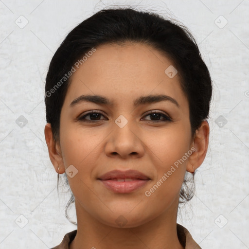 Joyful latino young-adult female with medium  black hair and brown eyes