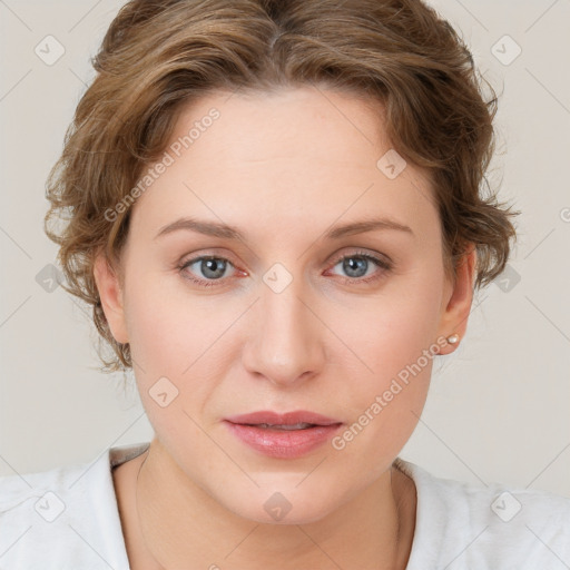 Joyful white young-adult female with medium  brown hair and blue eyes