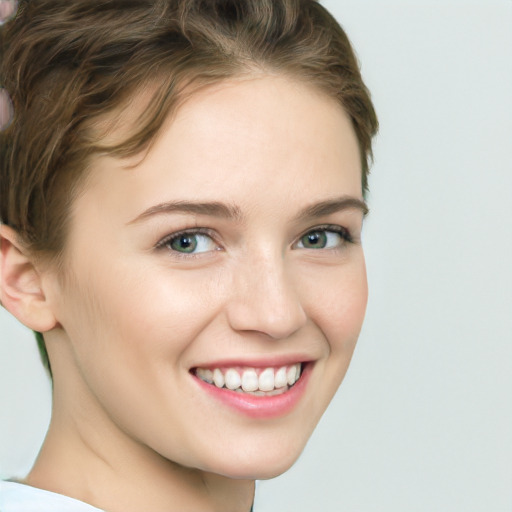 Joyful white young-adult female with medium  brown hair and green eyes