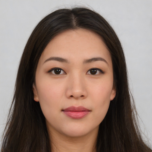 Neutral asian young-adult female with long  brown hair and brown eyes