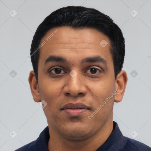 Neutral latino young-adult male with short  black hair and brown eyes