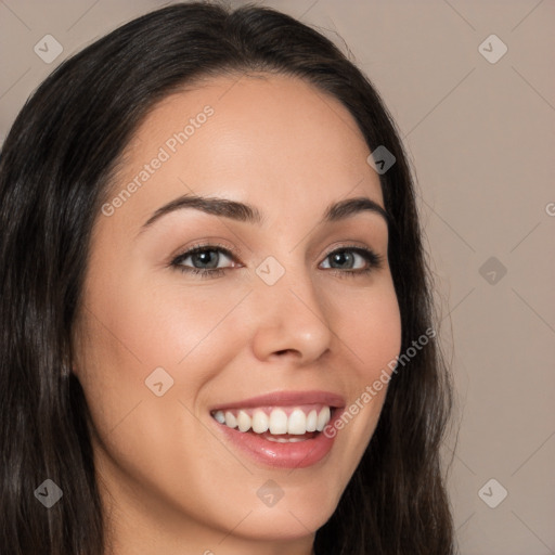 Joyful white young-adult female with long  brown hair and brown eyes