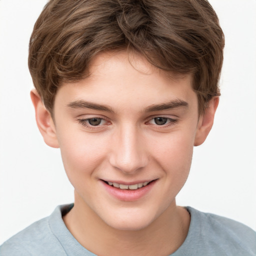 Joyful white child male with short  brown hair and brown eyes