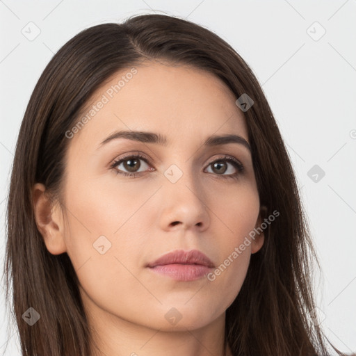 Neutral white young-adult female with long  brown hair and brown eyes