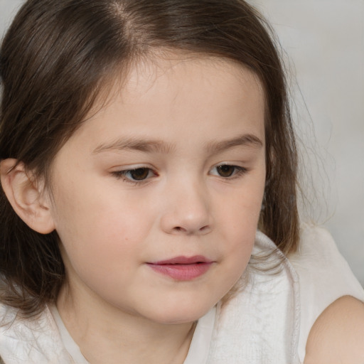 Neutral white child female with medium  brown hair and brown eyes