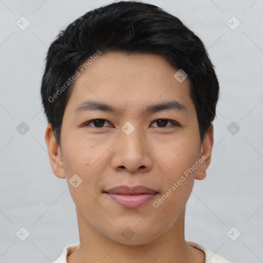 Joyful asian young-adult male with short  black hair and brown eyes