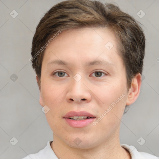 Joyful white young-adult female with short  brown hair and brown eyes