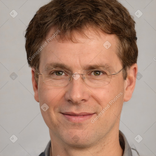 Joyful white adult male with short  brown hair and grey eyes