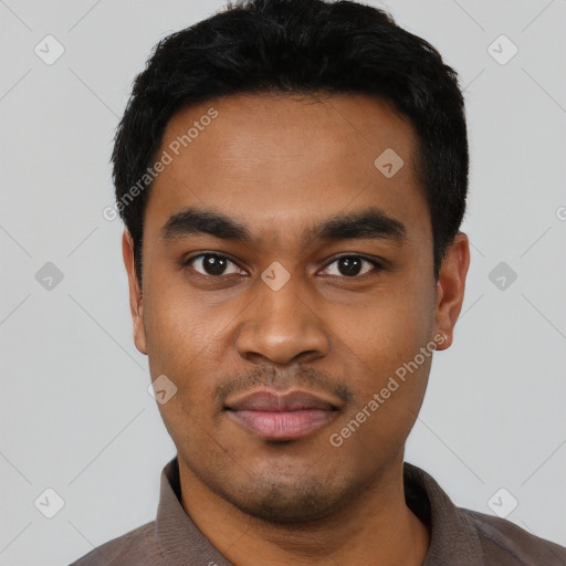 Neutral latino young-adult male with short  black hair and brown eyes