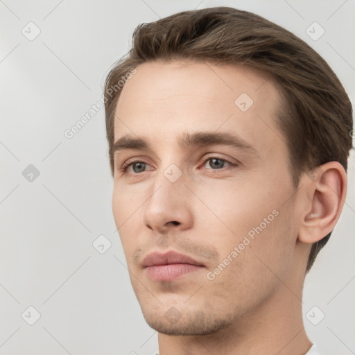 Neutral white young-adult male with short  brown hair and brown eyes