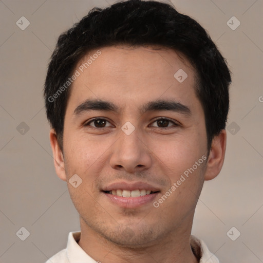 Joyful white young-adult male with short  black hair and brown eyes