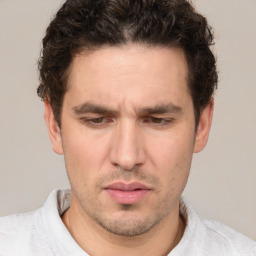 Neutral white adult male with short  brown hair and brown eyes