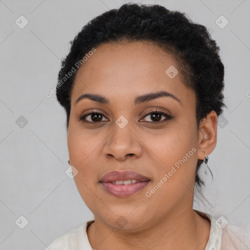 Joyful latino young-adult female with short  brown hair and brown eyes