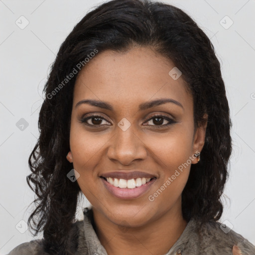 Joyful black young-adult female with long  brown hair and brown eyes