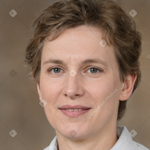 Joyful white adult female with short  brown hair and brown eyes