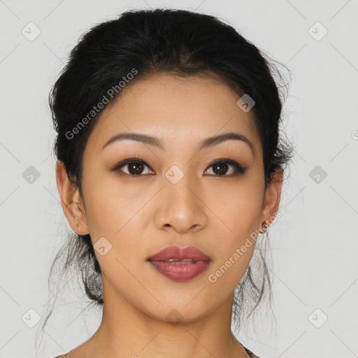 Joyful asian young-adult female with medium  black hair and brown eyes